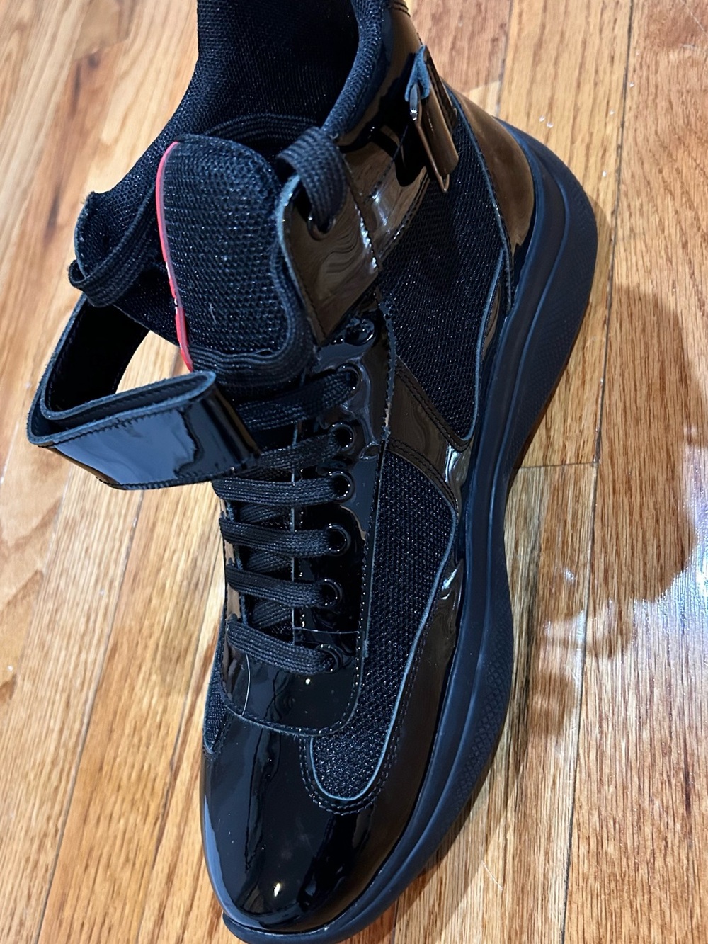 Prada Black High-Top Sneaker with Red Logo Stripe - Picture 3 of 7